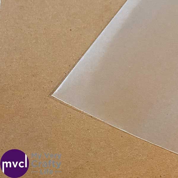 LP record sleeve and chipboard photo